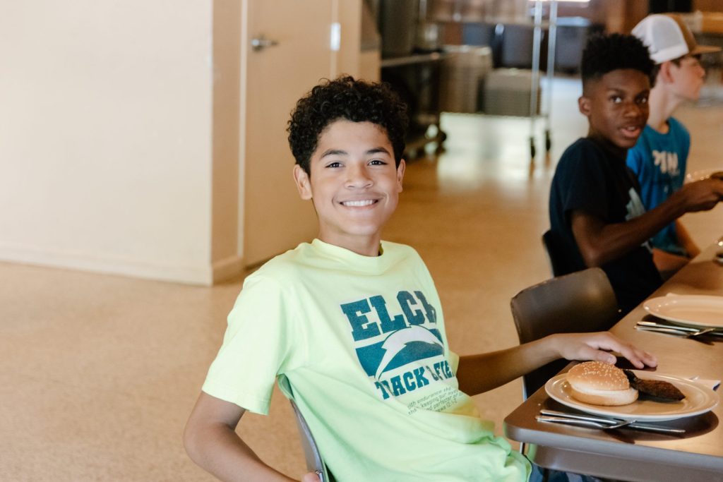 Campers sitting in the dining hall